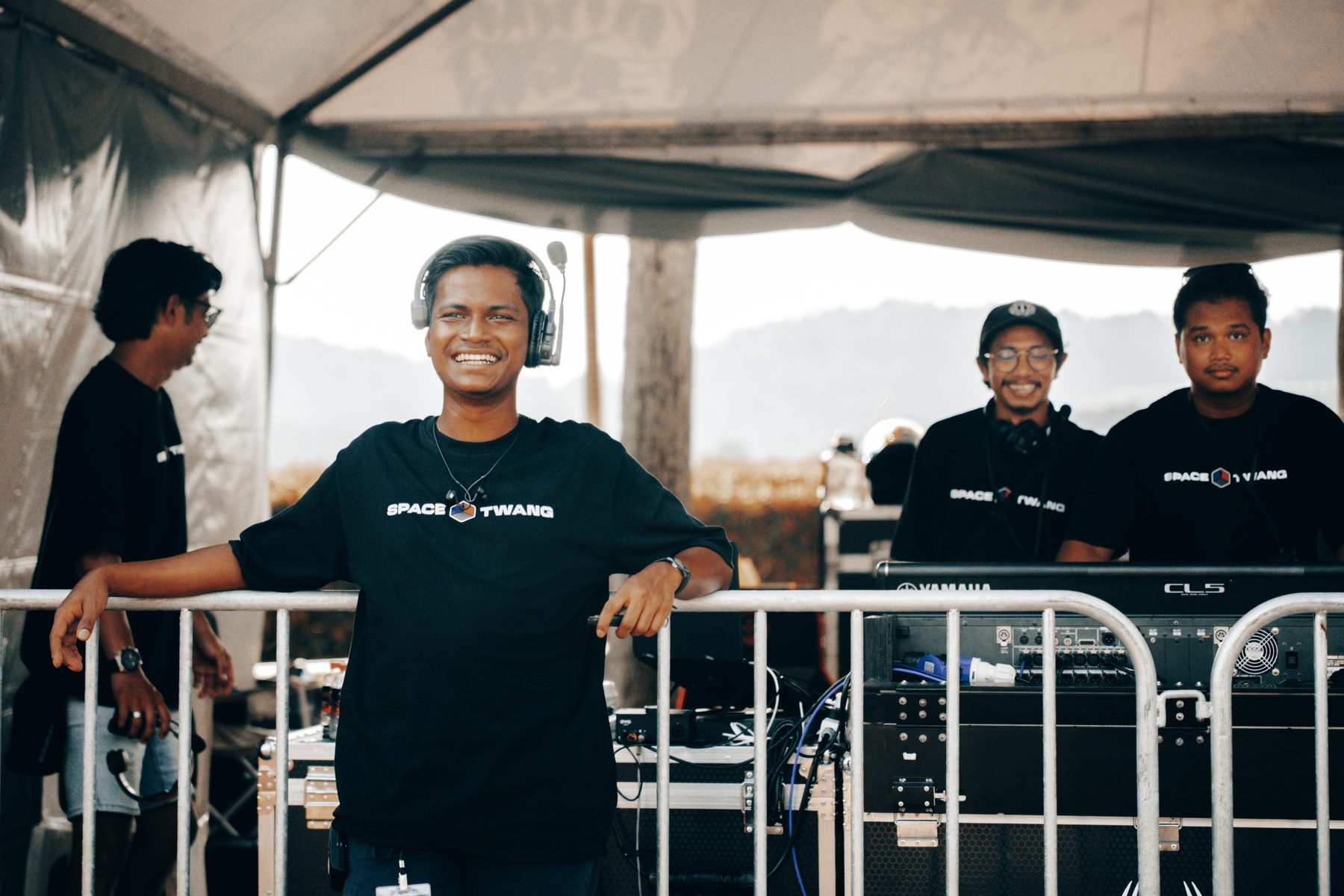 Three STP crew at the FOH tent